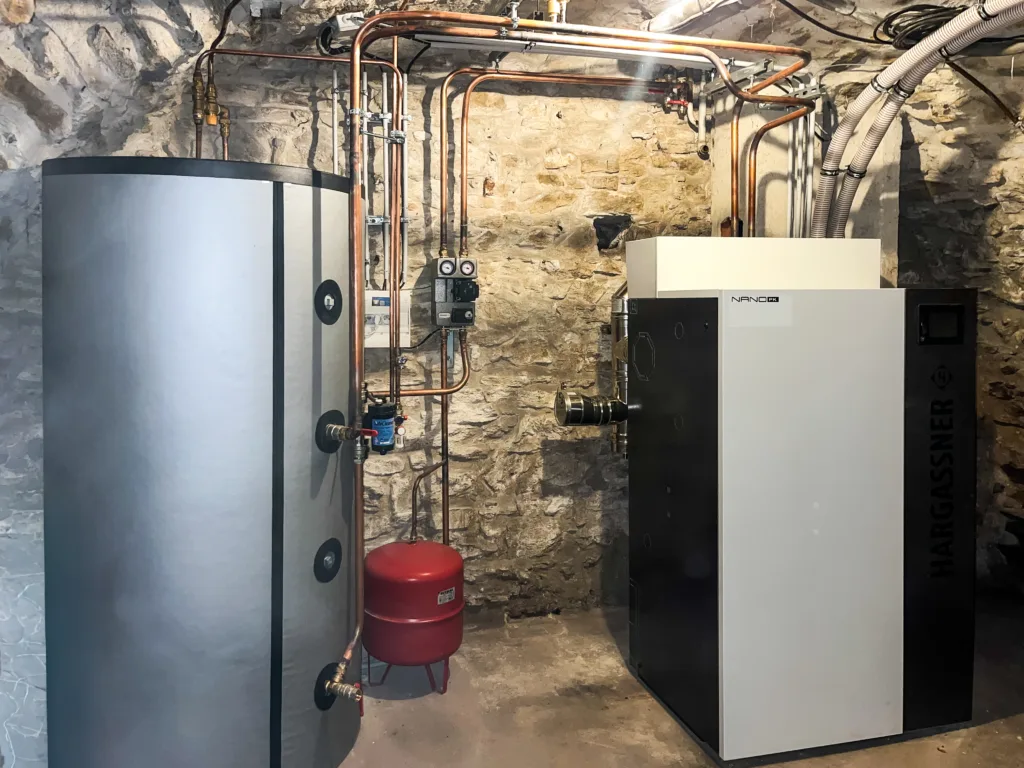 Fourniture et installation d'une chaudière à granulé en remplace d'une ancienne chaudière fioul non condensation à Vaugneray, dans l'Ouest Lyonnais